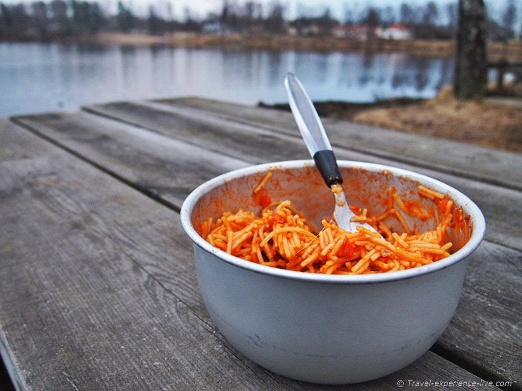 Spaghetti dinner next to a lake in Sweden.
