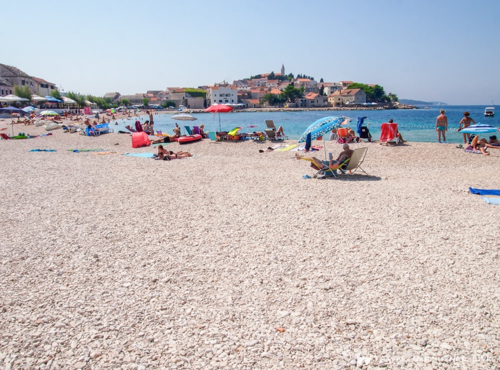 Pebble beach in the gorgeous town of Primošten, Croatia