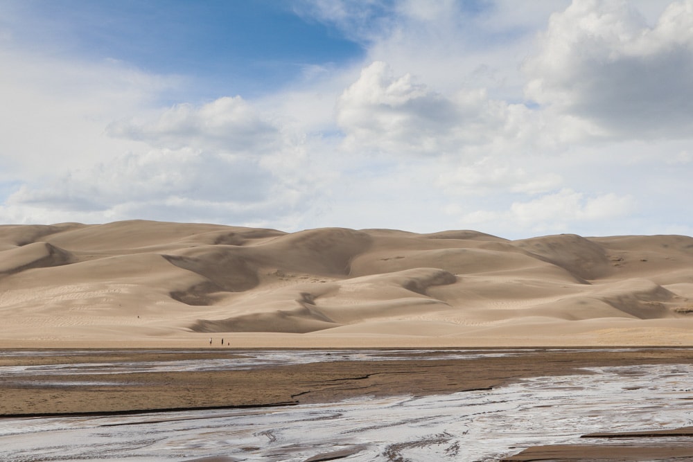 Sand dunes and Medano Creek, Great Sand Dunes National Park - National Monuments That Became National Parks