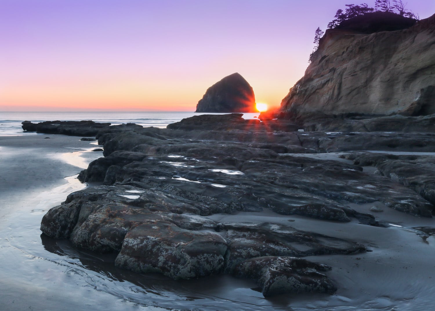 Sunset at beach in Cape Kiwanda, Pacific City - Best Beach Road Trips from Portland, Oregon