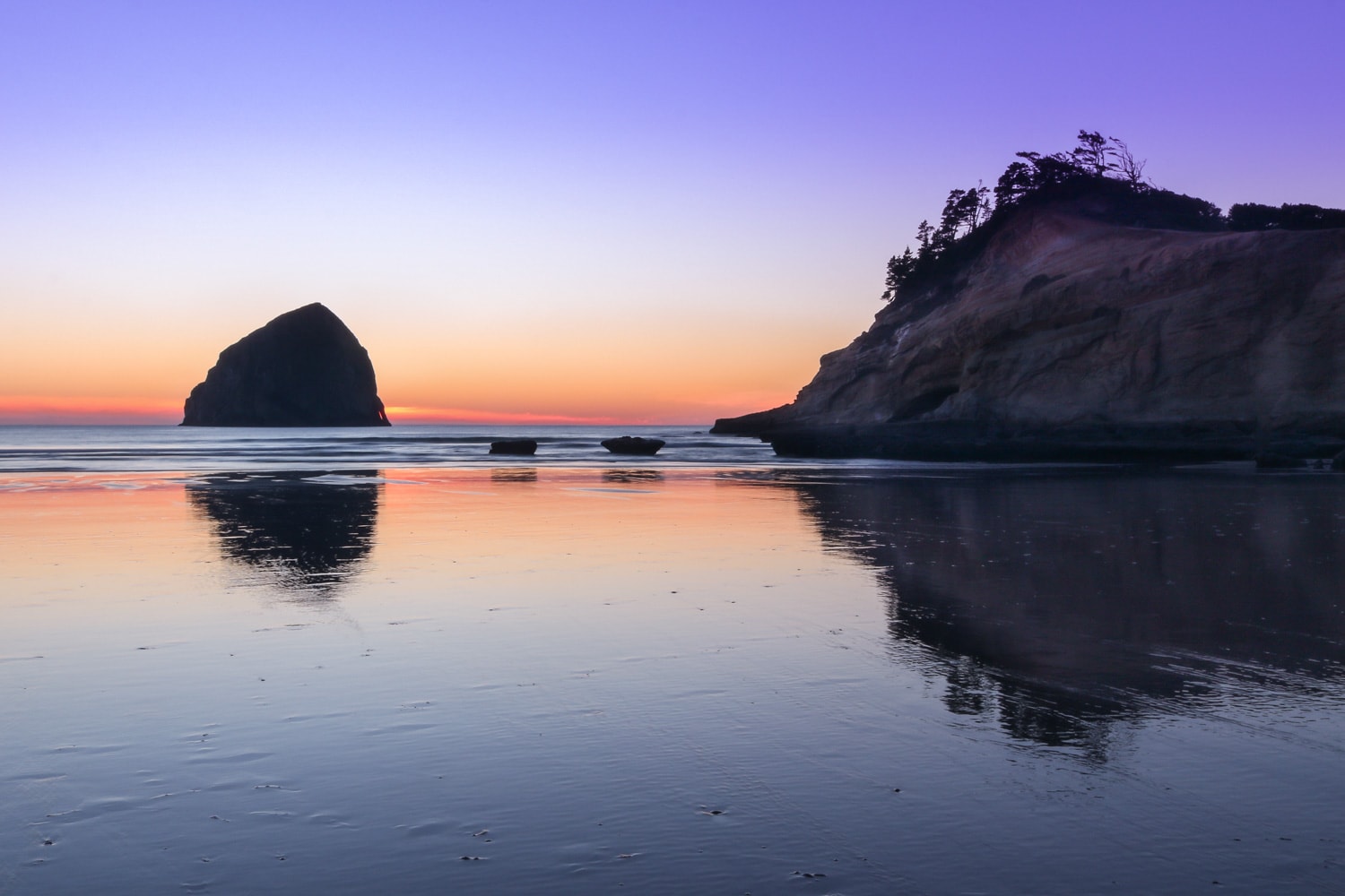 Sunset at Haystack Rock and Cape Kiwanda, Pacific City, Northern Oregon Coast Attractions