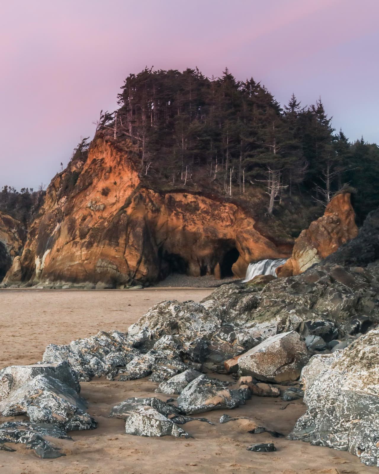 Hug Point State Park cliff and waterfall, Oregon Coast