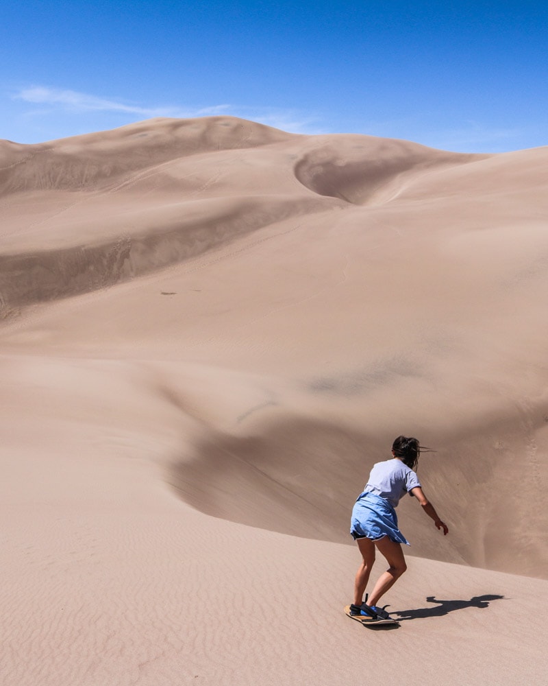 Sand boarding in Great Sand Dunes National Park, Colorado