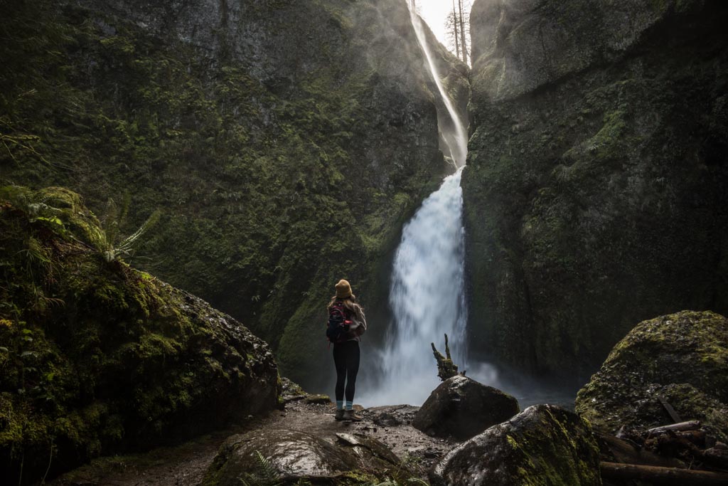 Wahclella Falls and hiker in the Columbia River Gorge, Oregon, USA