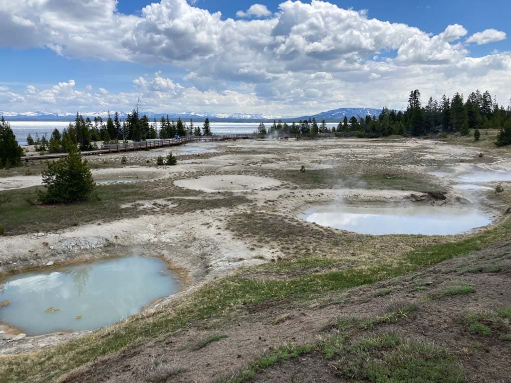West Thumb Geyser Basin at Yellowstone Lake, a popular spring hike in Yellowstone National Park