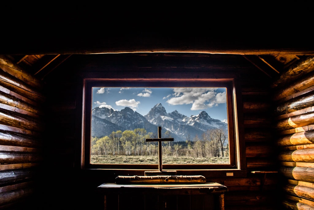 Teton Mountains seen through the window in the Chapel of the Transfiguration, Grand Teton National Park