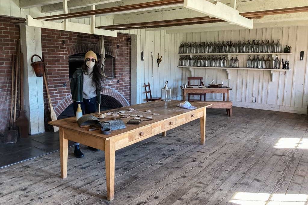Visitor with face mask in bakery at Fort Vancouver National Historic Site, Washington