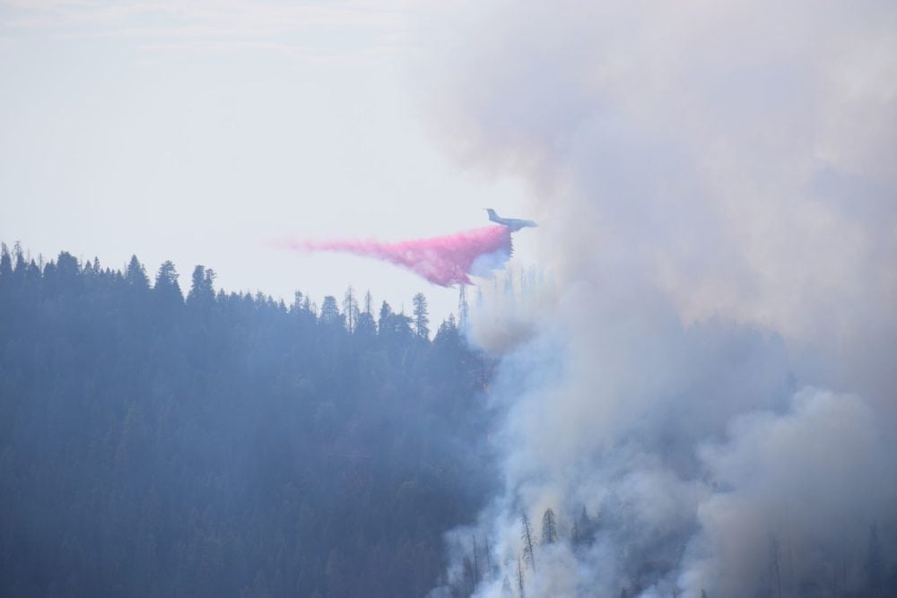 Plane drops water and retardant on wildfires in Sequoia National Park - Image credit NPS