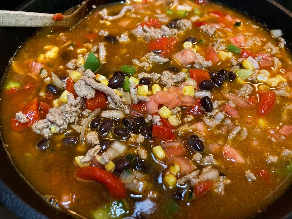 Ground turkey taco soup in cast-iron pot