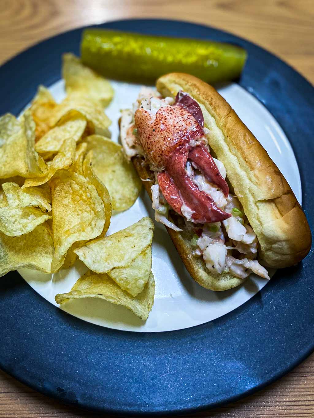 Maine lobster rolls recipe with kettle chips and a dill pickle