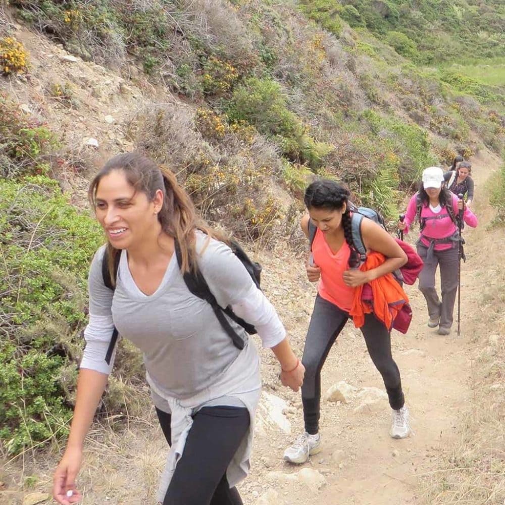 Group of women hiking with Latino Outdoors