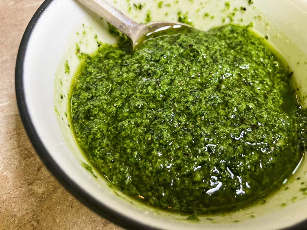 Carrot greens pesto in bowl