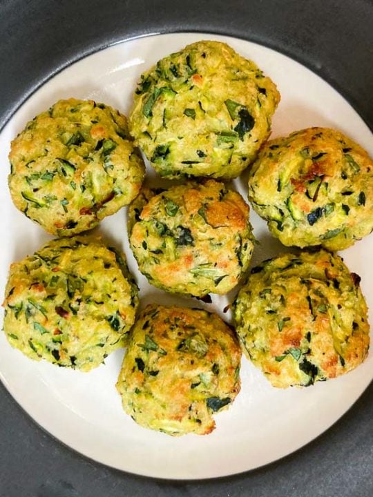 Baked zucchini summer squash balls on plate