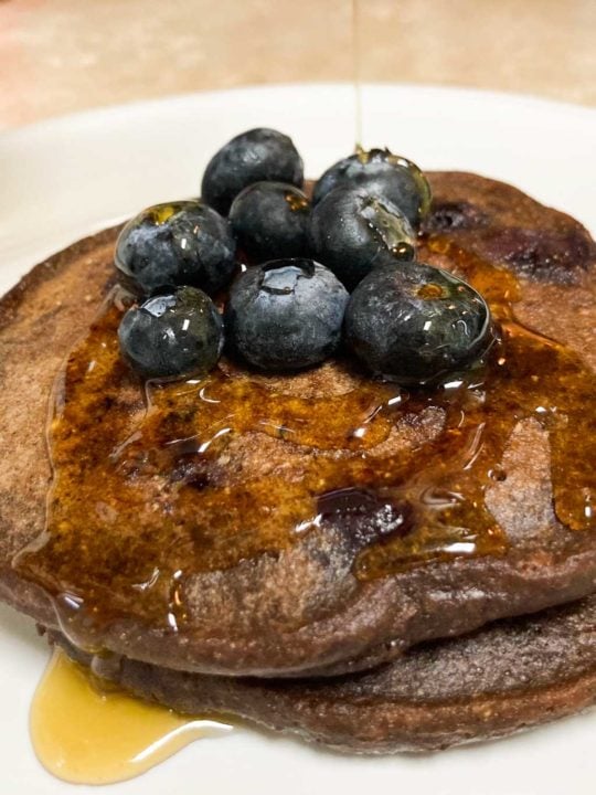 Wild rice pancakes with blueberries and maple syrup drizzle recipe