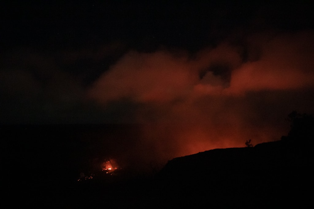 Kilauea eruption at night seen from Uēkahuna Overlook in Hawai'i Volcanoes National Park, Hawaii