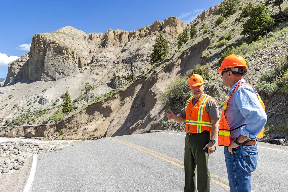 Superintendent, Cam Sholly, and Chief of Facility Maintenance, Duane Bubac, looking at damage in Gardner River Canyon - Photo Credit: NPS / Jacob W. Frank