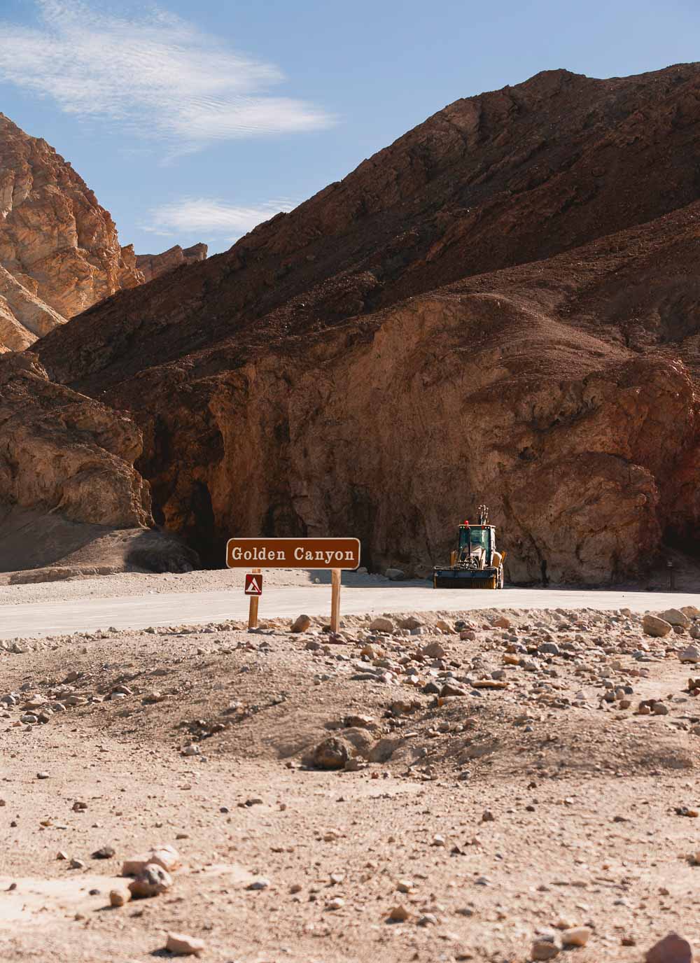 Road crew removes debris from parking lot at Golden Canyon in Death Valley - Photo Credit NPS