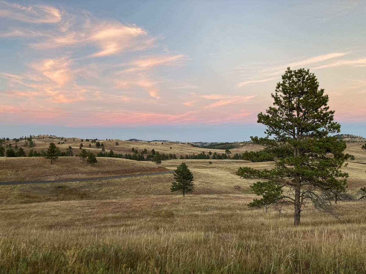Sunset over the prairie on NPS 6 in Wind Cave National Park, South Dakota