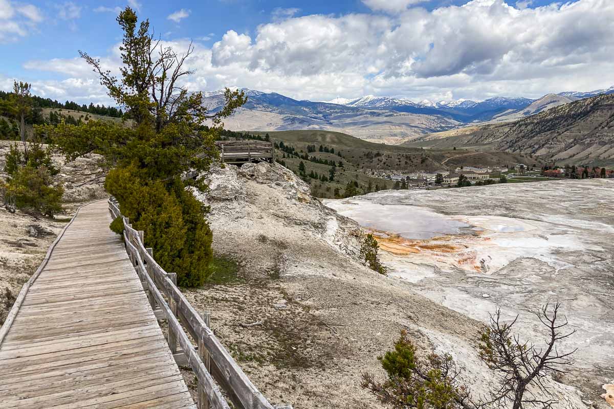 Boardwalk with view of Mammoth Hot Springs Historic District in Yellowstone National Park