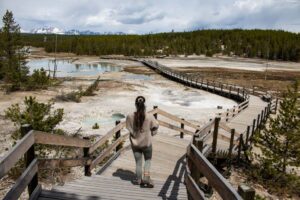 Porcelain Basin boardwalk hiker, Norris Geyser Basin, Yellowstone National Park