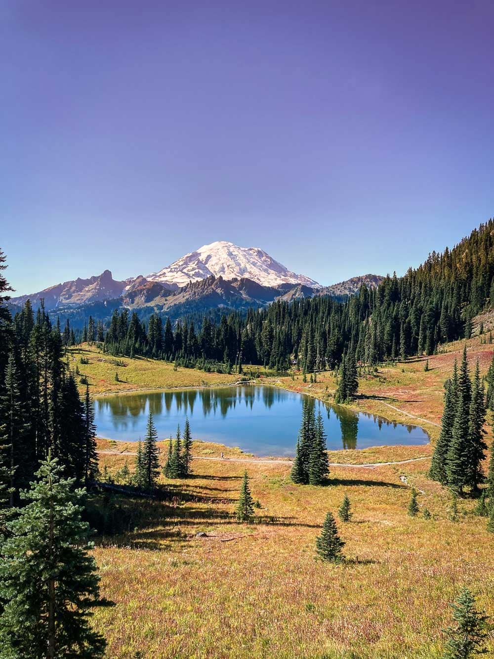 Tipsoo Lake and Mount Rainier in the fall seen from Chinook Pass, one of the best places to see the sunset in Mount Rainier National Park
