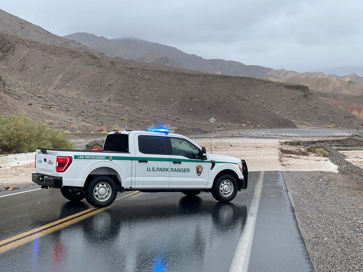 Park Ranger vehicle near flooding in Death Valley National Park due to Tropical Storm Hilary - Image credit NPS