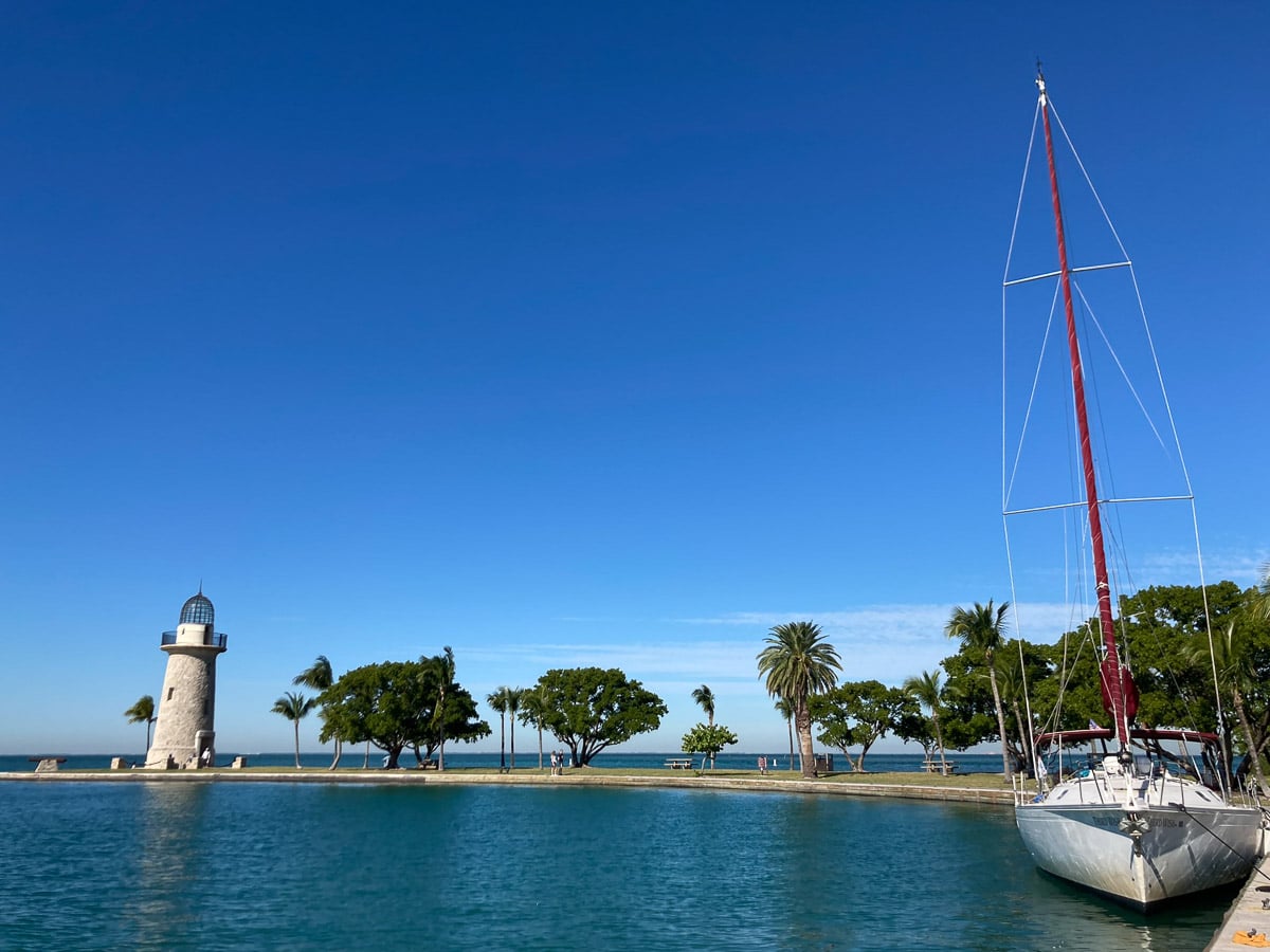 Boat and Boca Chita Key Lighthouse on Boca Chita Key in Biscayne National Park, Florida