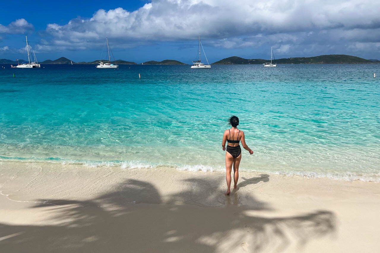 Visitor on tropical Honeymoon Beach in Virgin Islands National Park