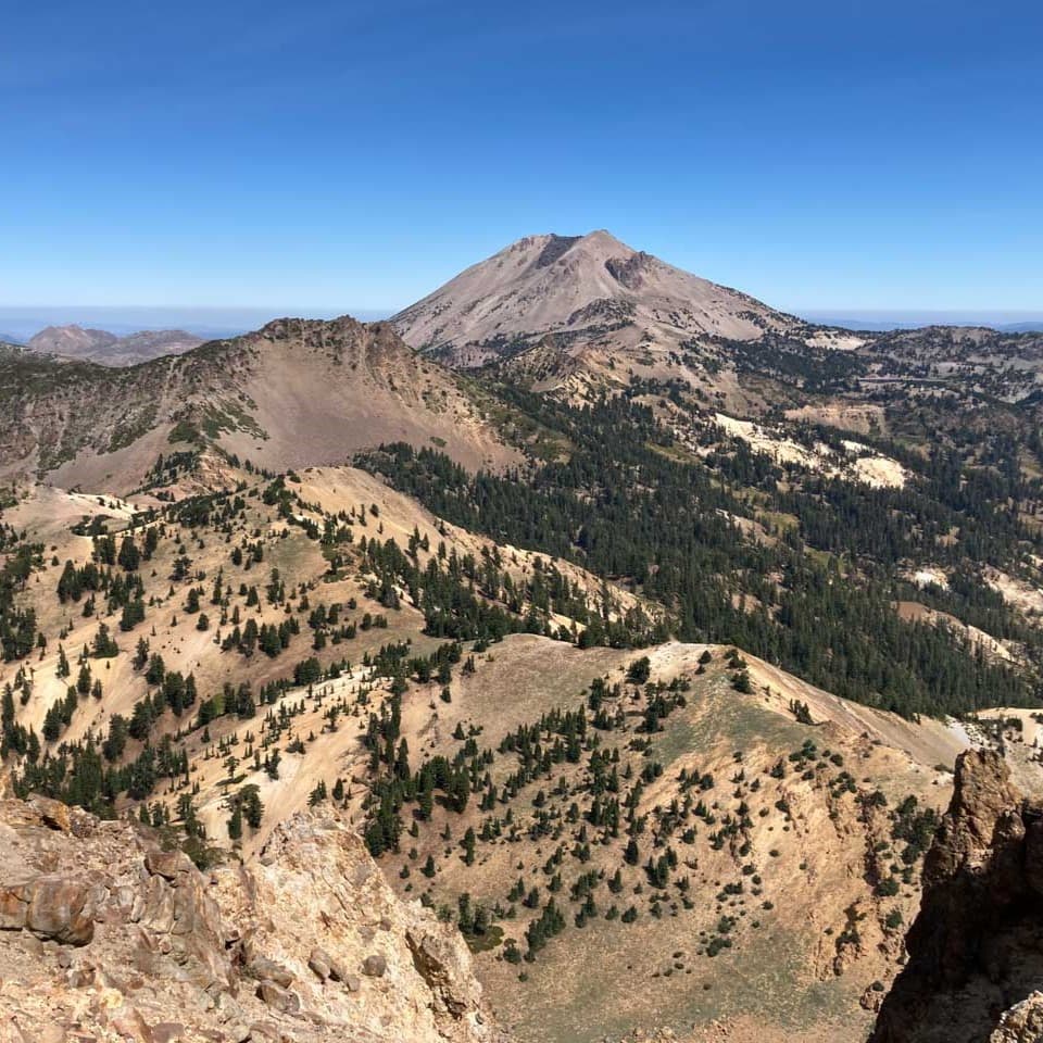 Lassen Peak seen from Brokeoff Mountain summit in Lassen Volcanic National Park, California