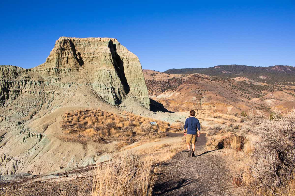Hiker on the Story in Stone Trail at the Sheep Rock Unit of John Day Fossil Beds National Monument